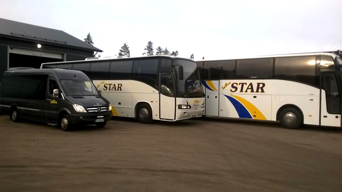 Charter buses and a taxi